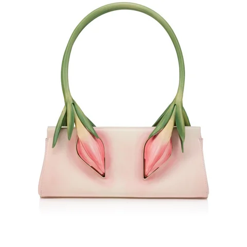 Close-up of sculptural tulip stem handle on Louboutin tulip baguette bag price review