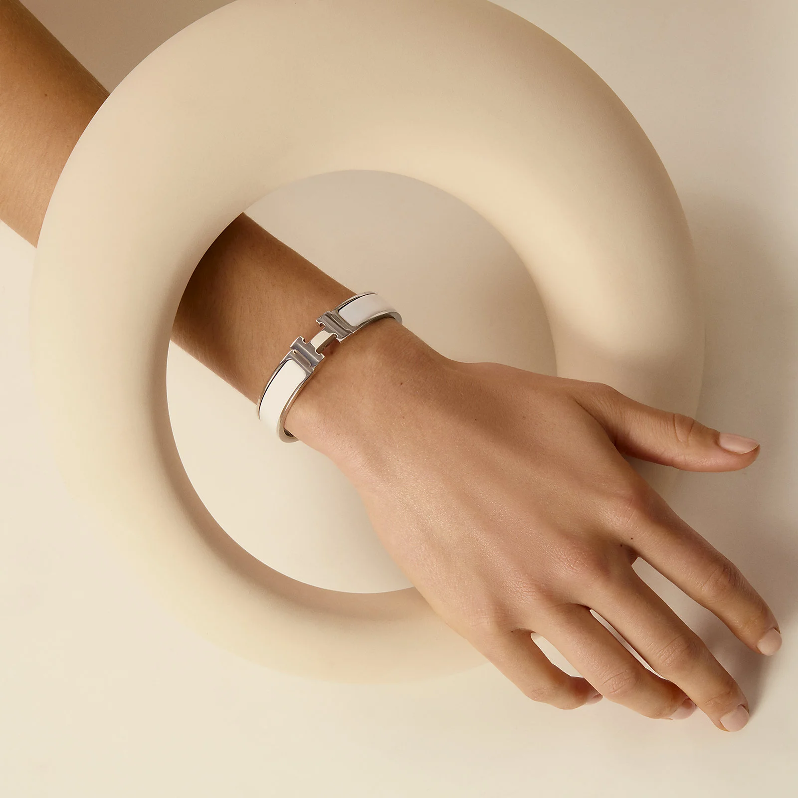 Hermes Clic H bracelet in Cloud Dancer white with gold hardware